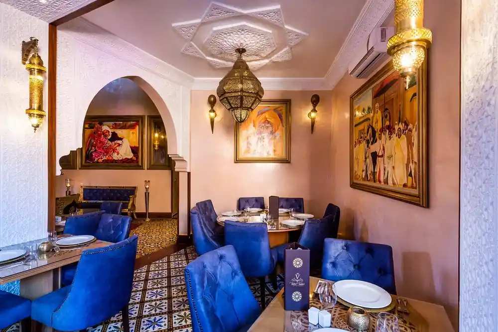 Moroccan dining room with blue seating